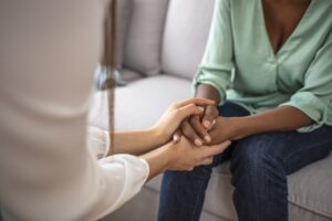 mental health professional talks to patient during 1013 evaluation in Georgia