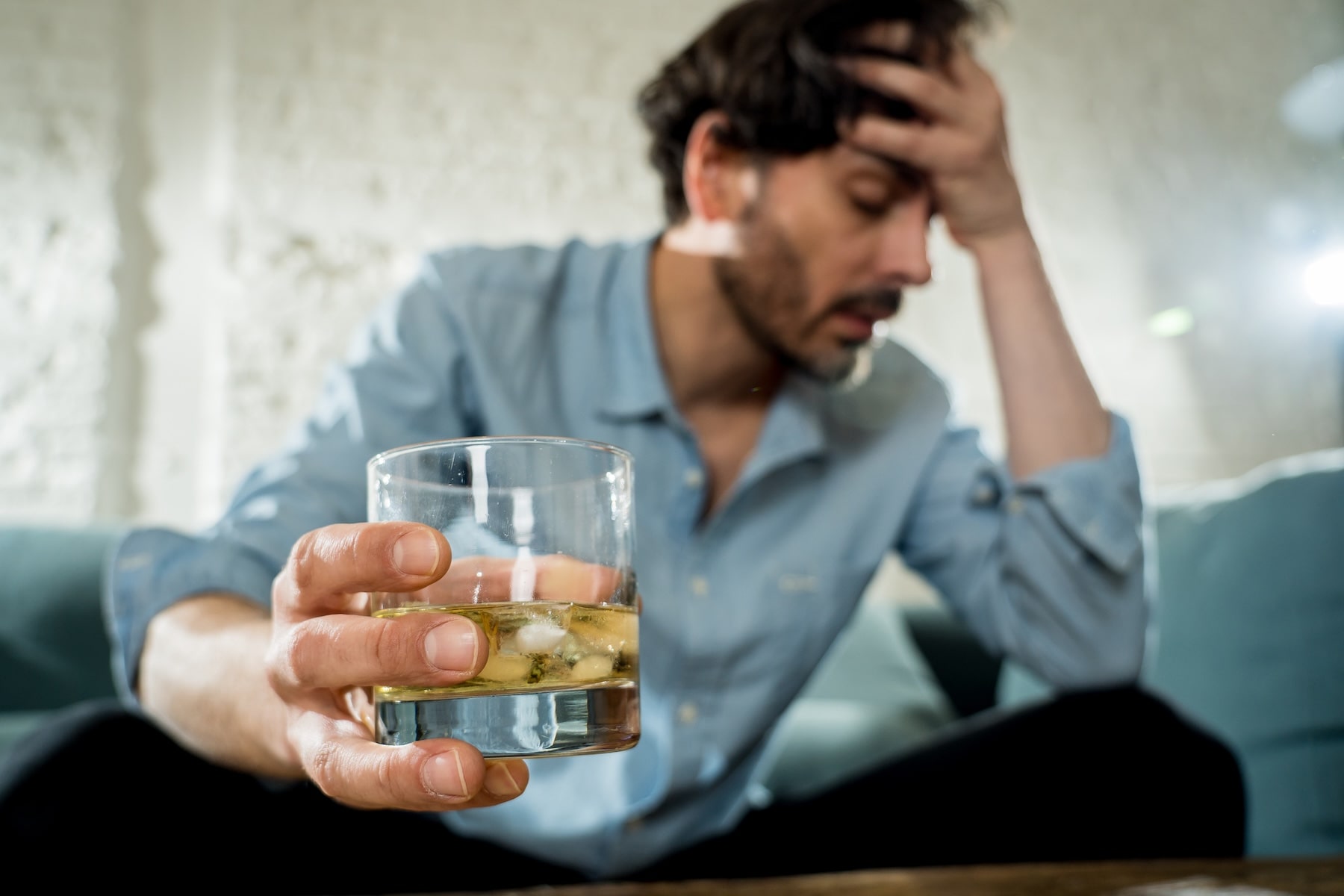 man struggling with alcohol and wondering if he has substance use disorder
